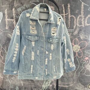 Blue Jean jacket ripped